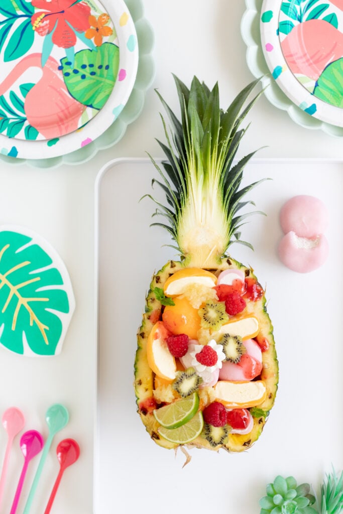 tropical mochi sundae served in a halved pineapple