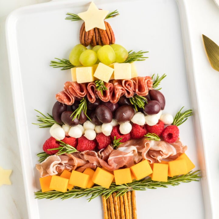 christmas tree charcuterie board with meats and cheeses