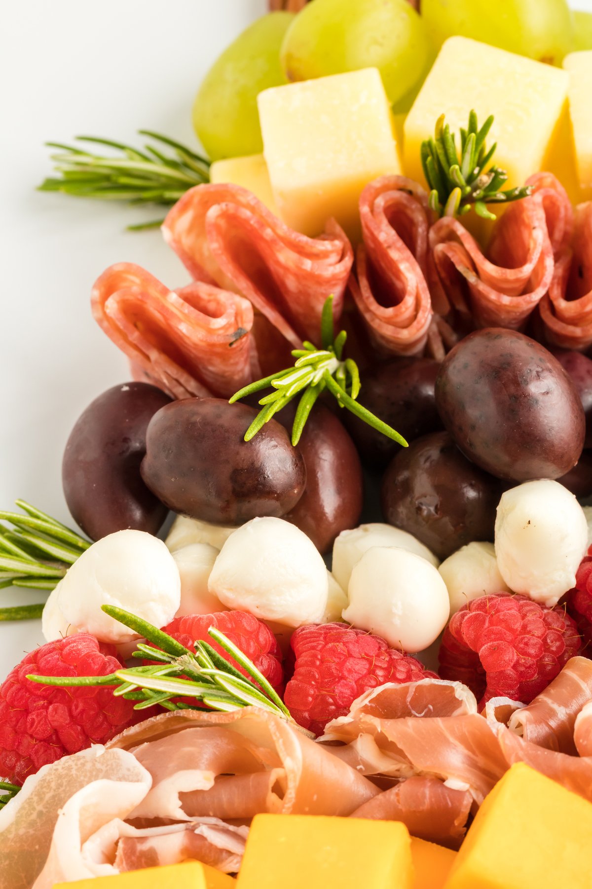 up close view of layers of appetizers to form a christmas tree