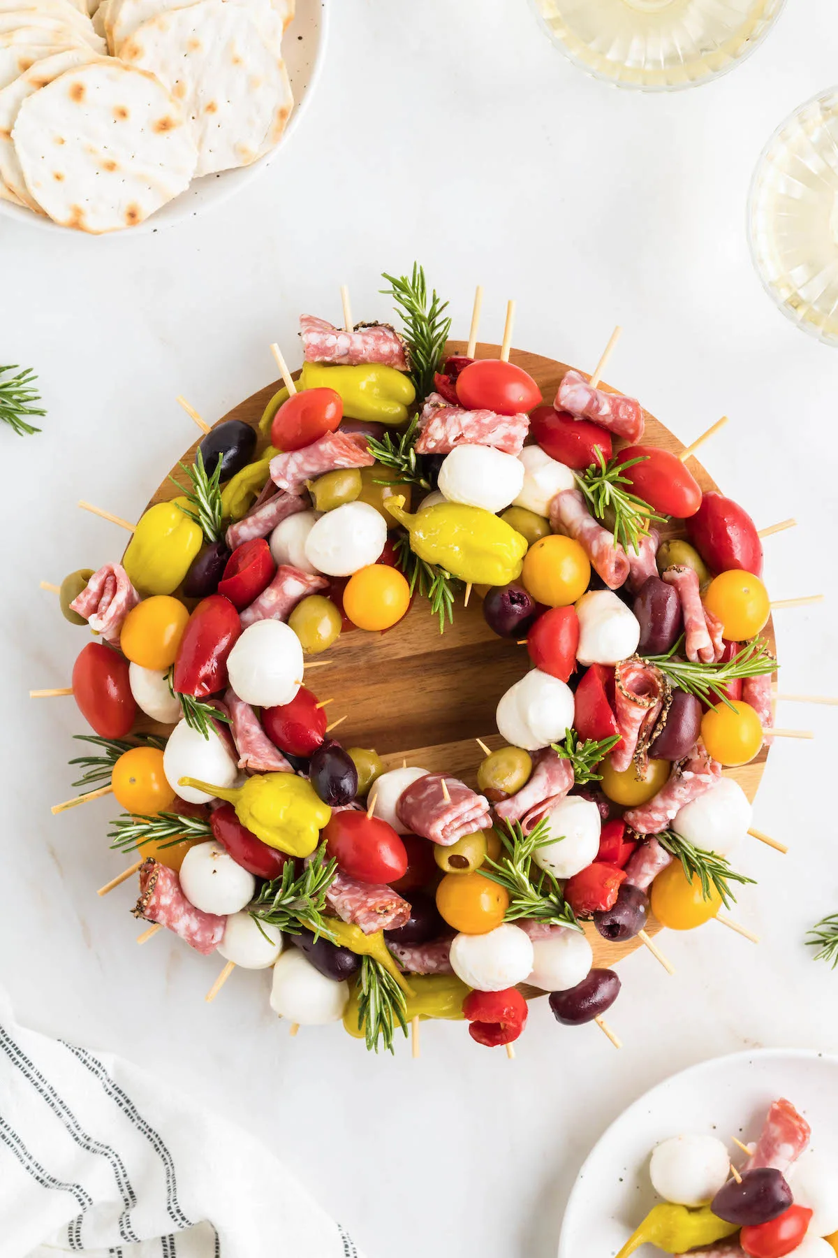 over the top photo of an antipasto wreath, perfect for holiday hosting