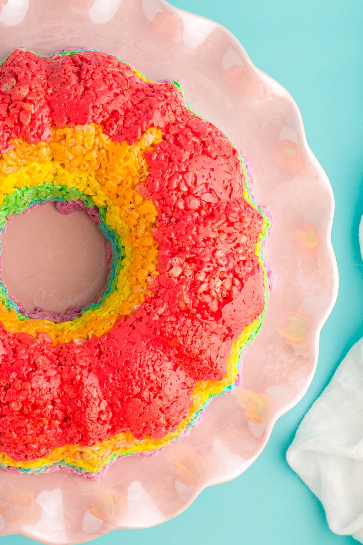 overhead view of a rainbow rice cereal cake made with a bundt pan