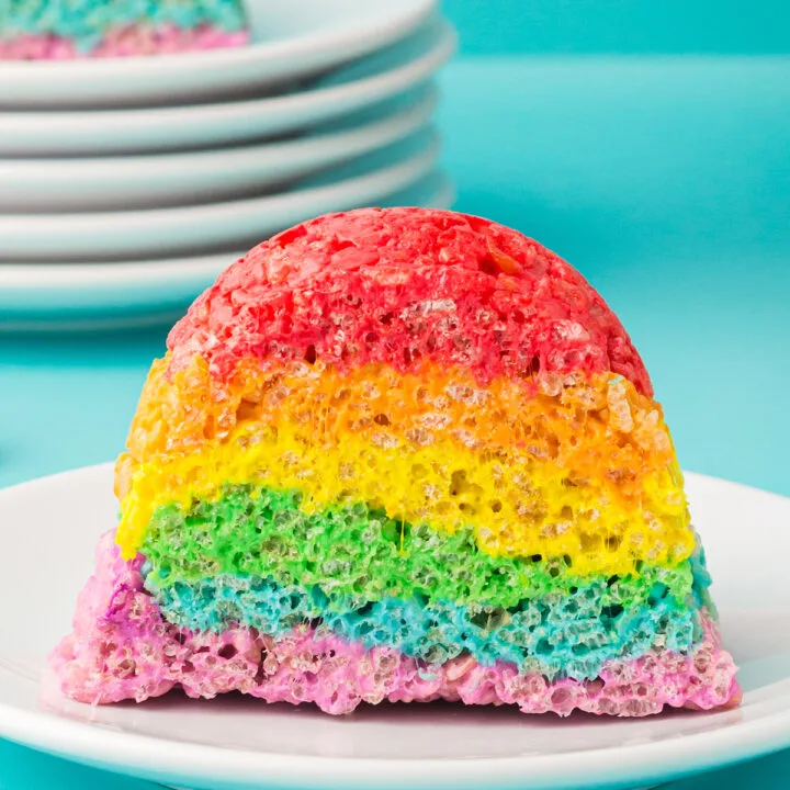 up close slice of rainbow rice krispies cake