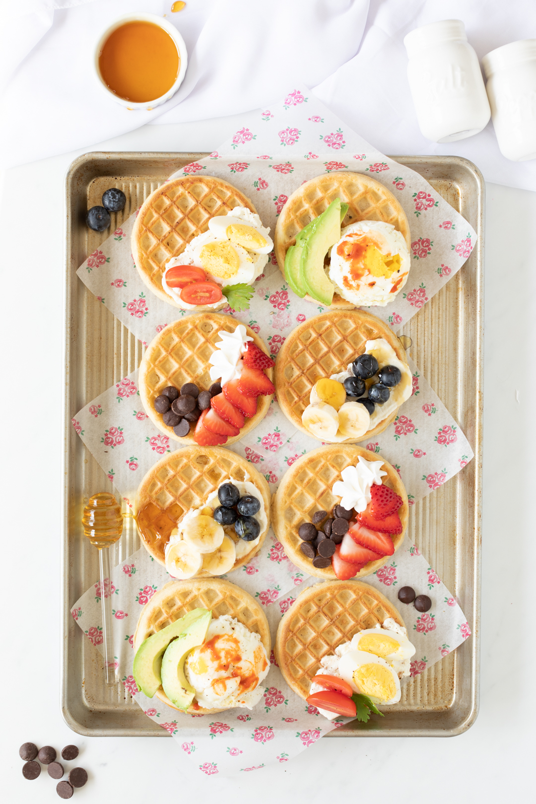 tray of delicious sweet and savory topped waffles