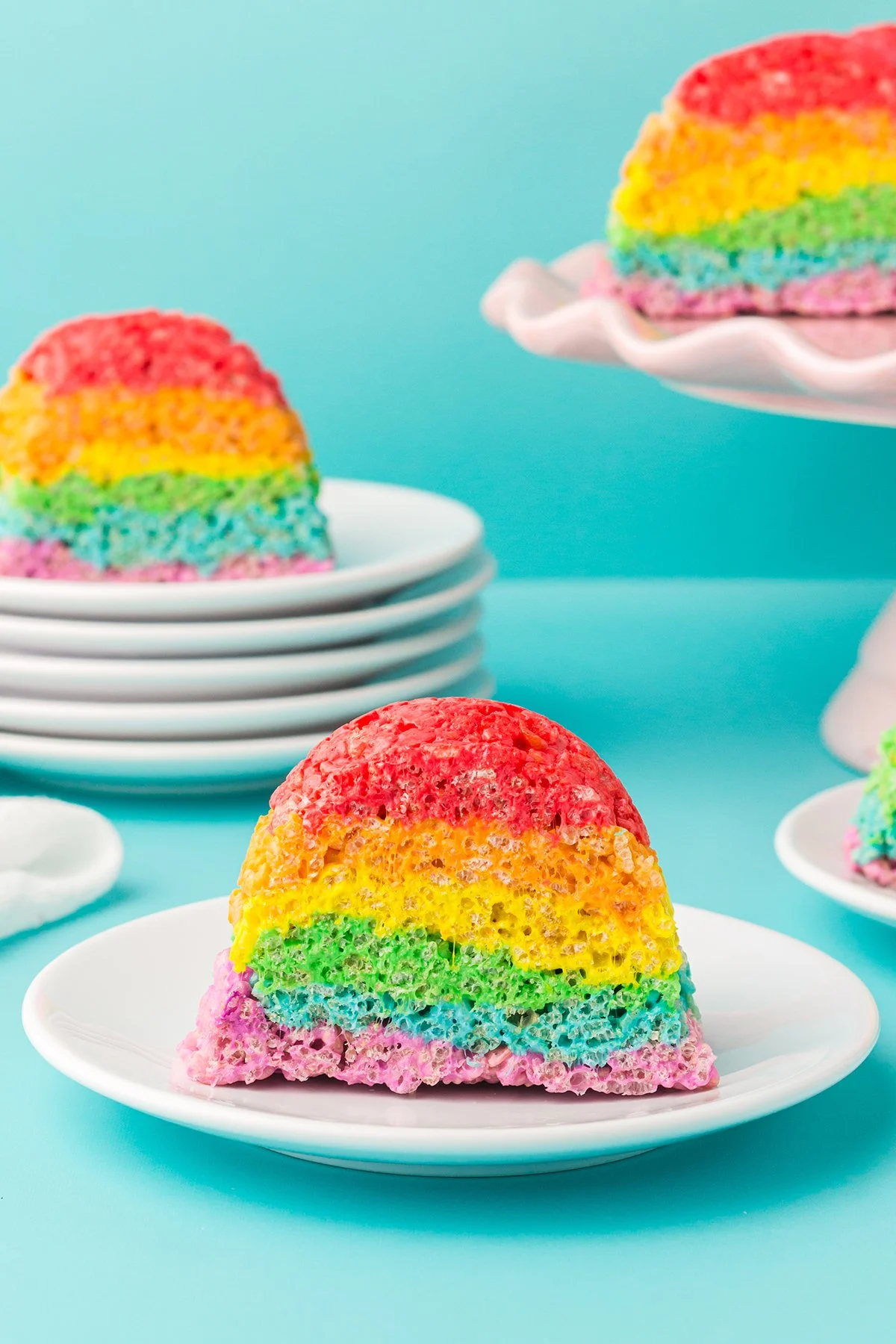 slice of colorful cake on a white dish