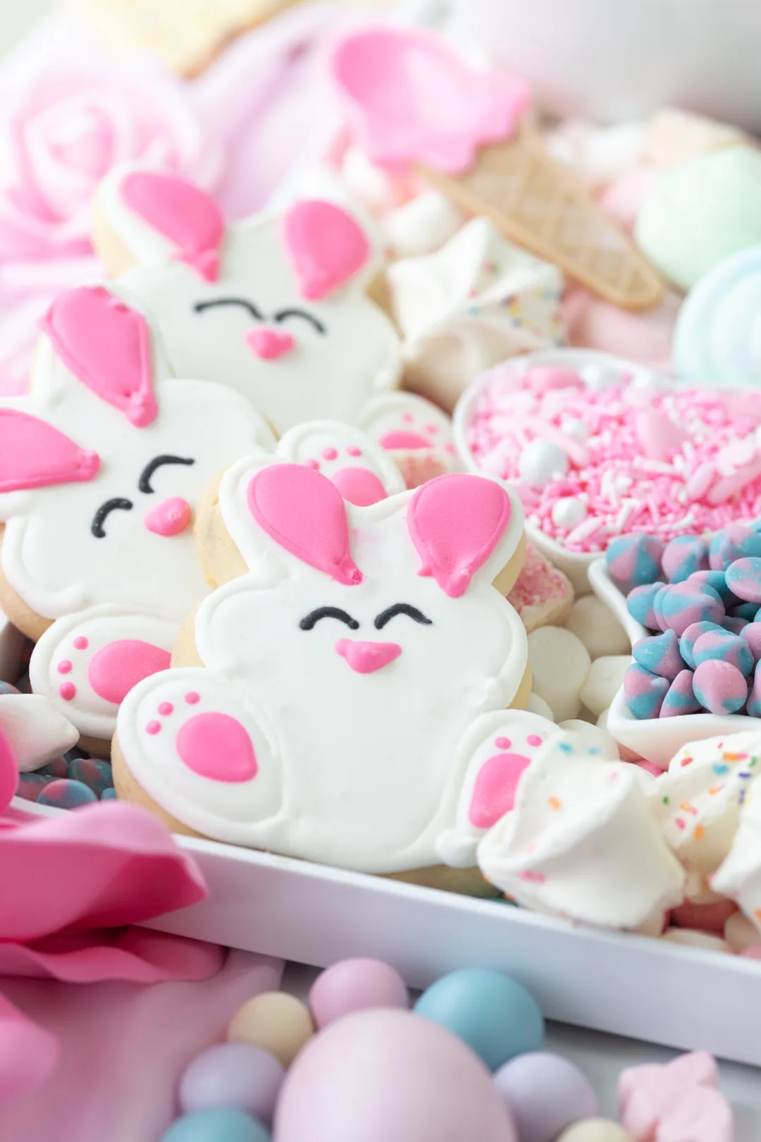 close up of really cute Easter bunny cookies set on a hot cocoa platter