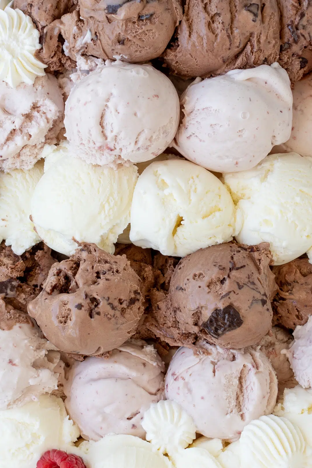 pretty up close view of chocolate, strawberry and vanilla ice cream scoops