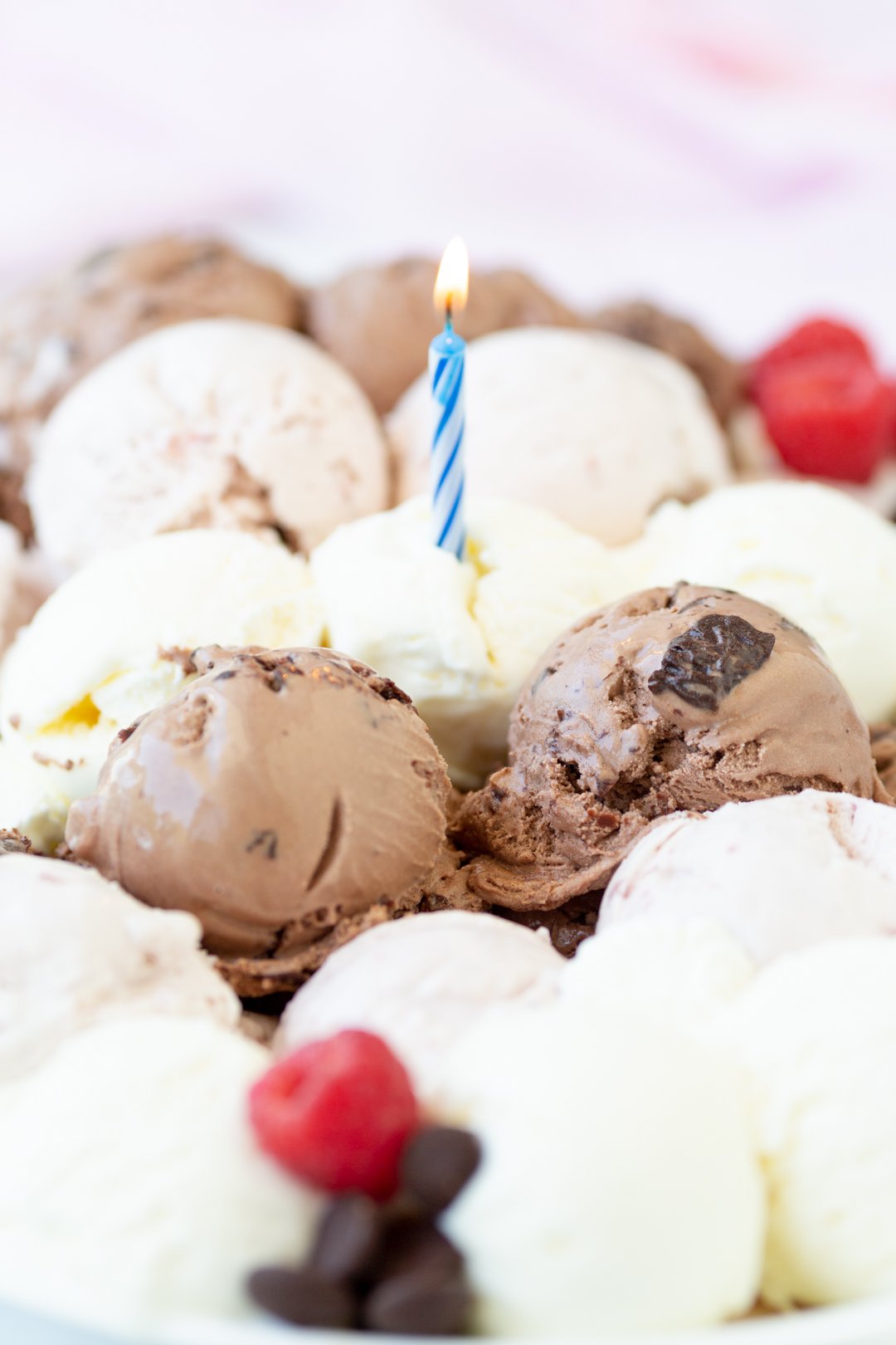 birthday candle in a pile of ice cream scoops