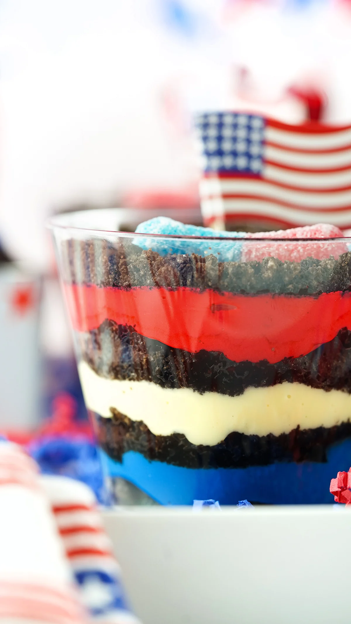 cup close view of red, white and blue pudding cup with crushed oreos