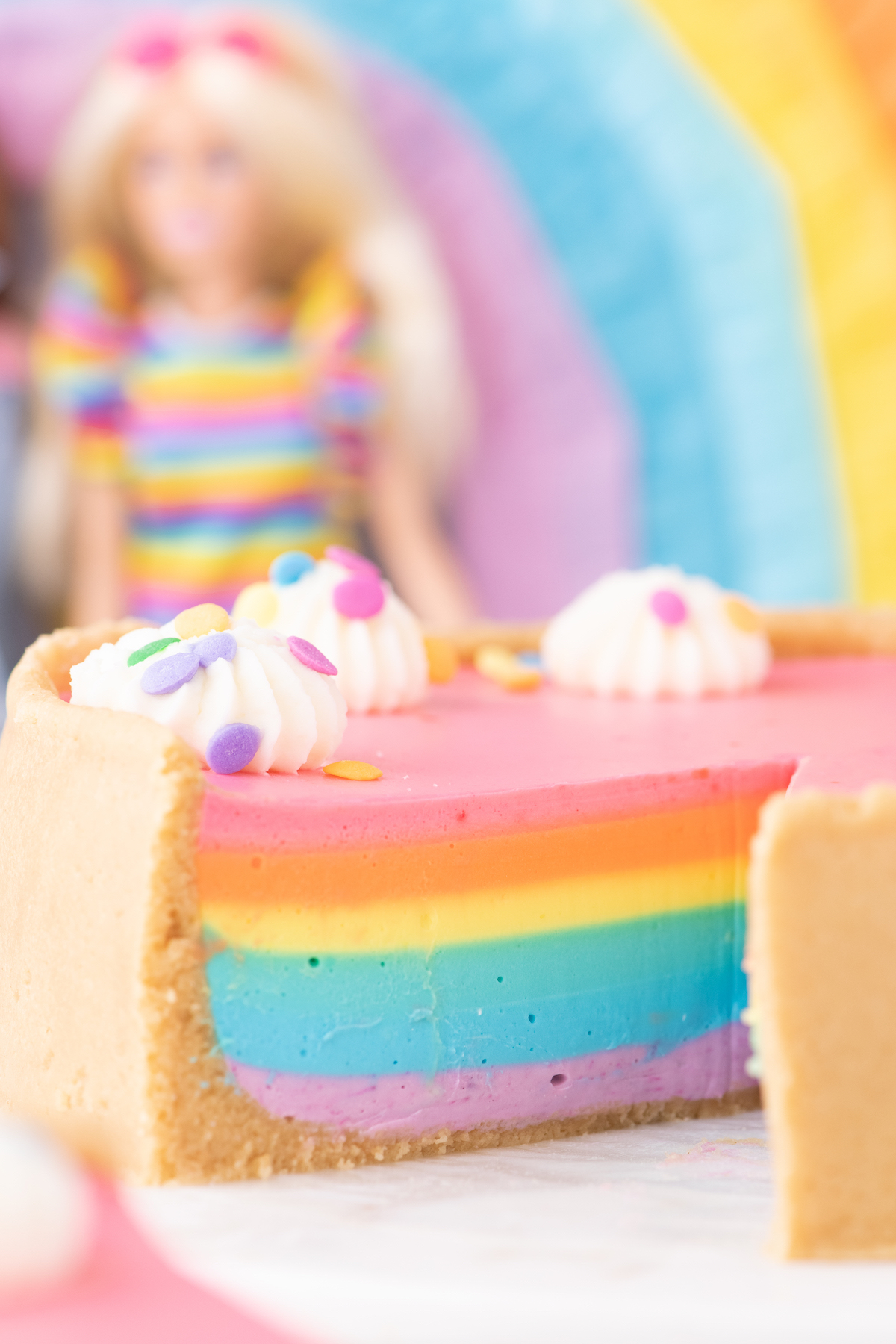 A no-bake cheesecake fit for a Barbie party - with all the colors of the rainbow.
