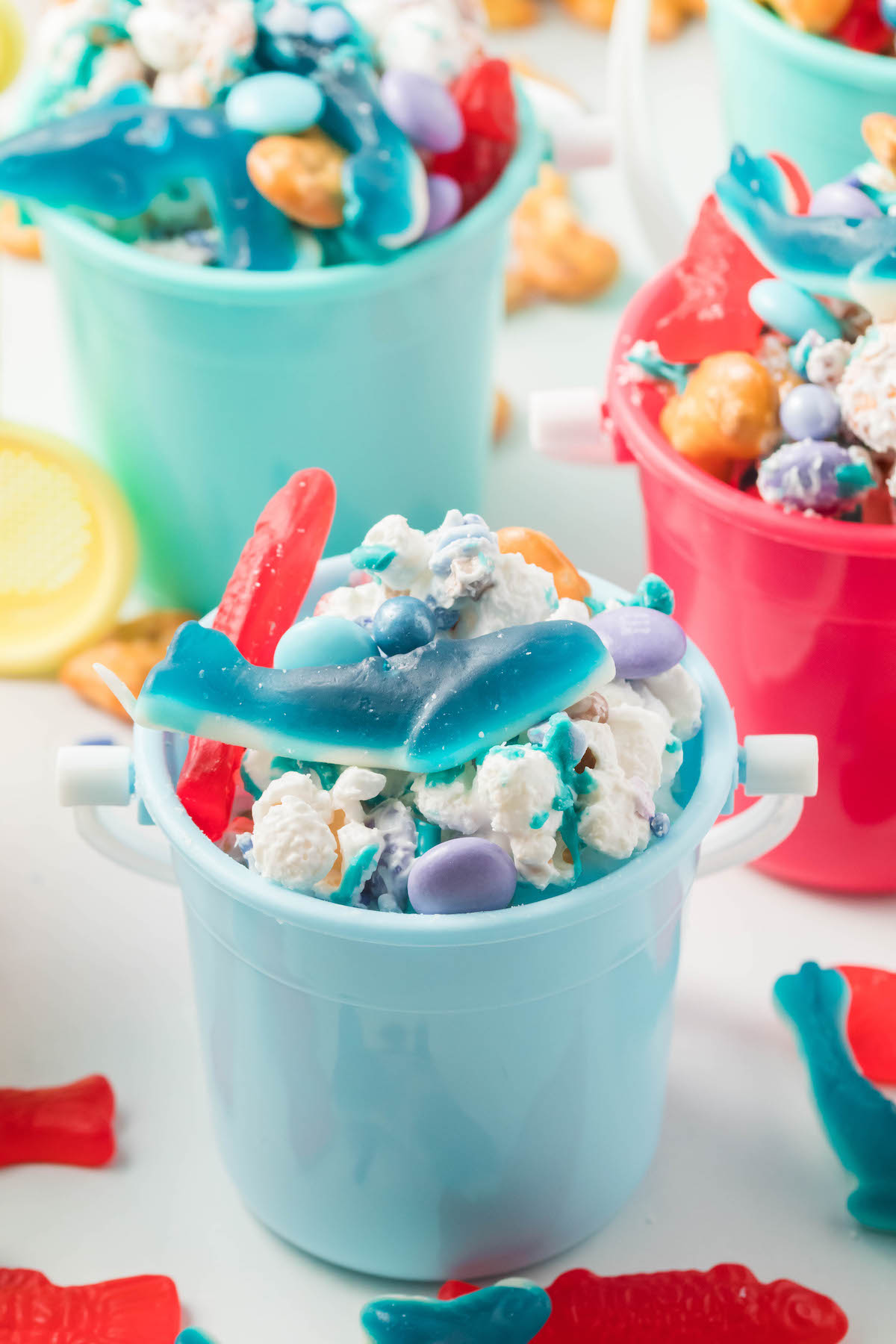 cute beach snack mix served in the cutest mini beach pails