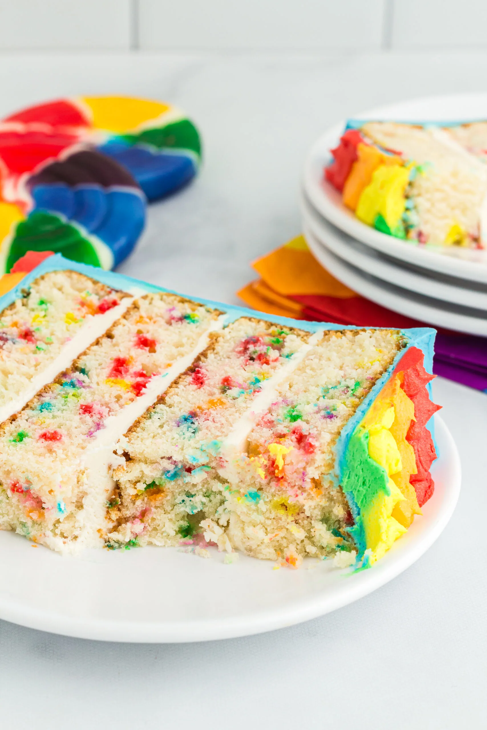 pretty rainbow cake spice on a small white plate