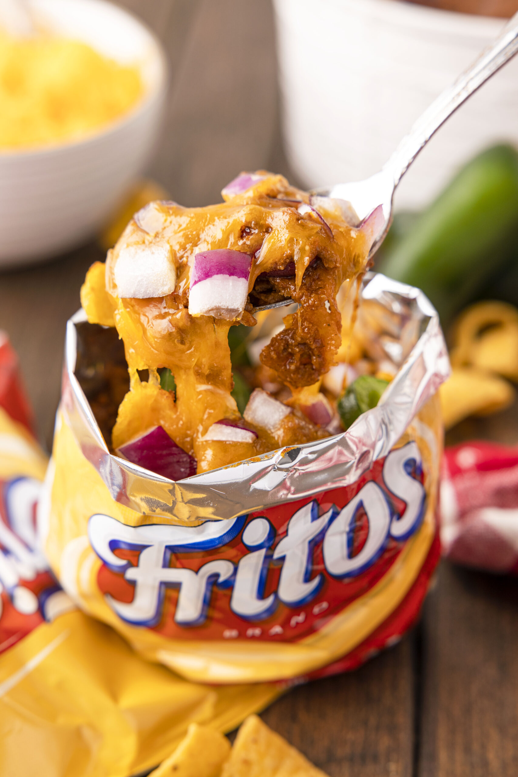 angled down view inside individual sized fritos bag willed with frito pie