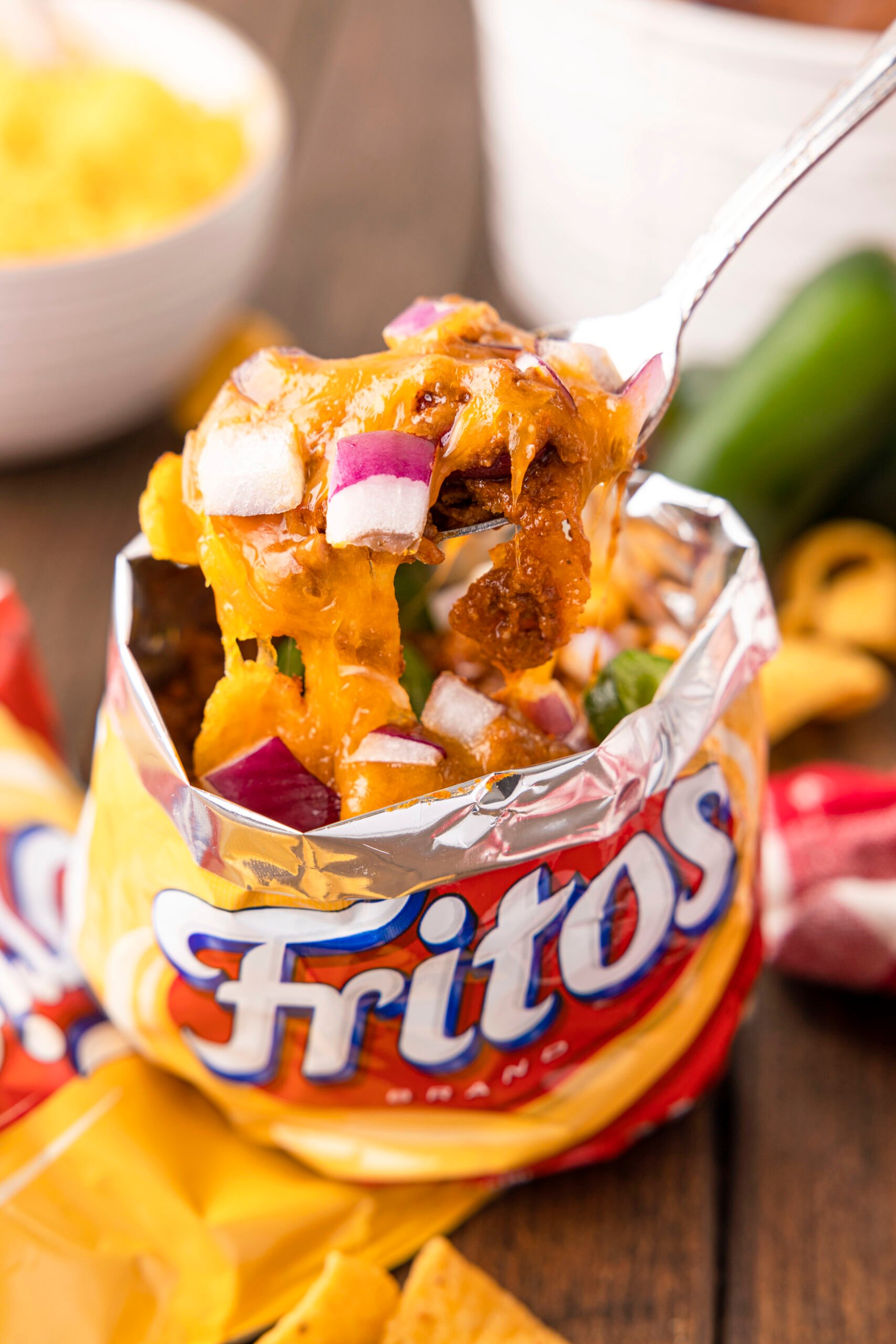 angled down view inside individual sized fritos bag willed with frito pie