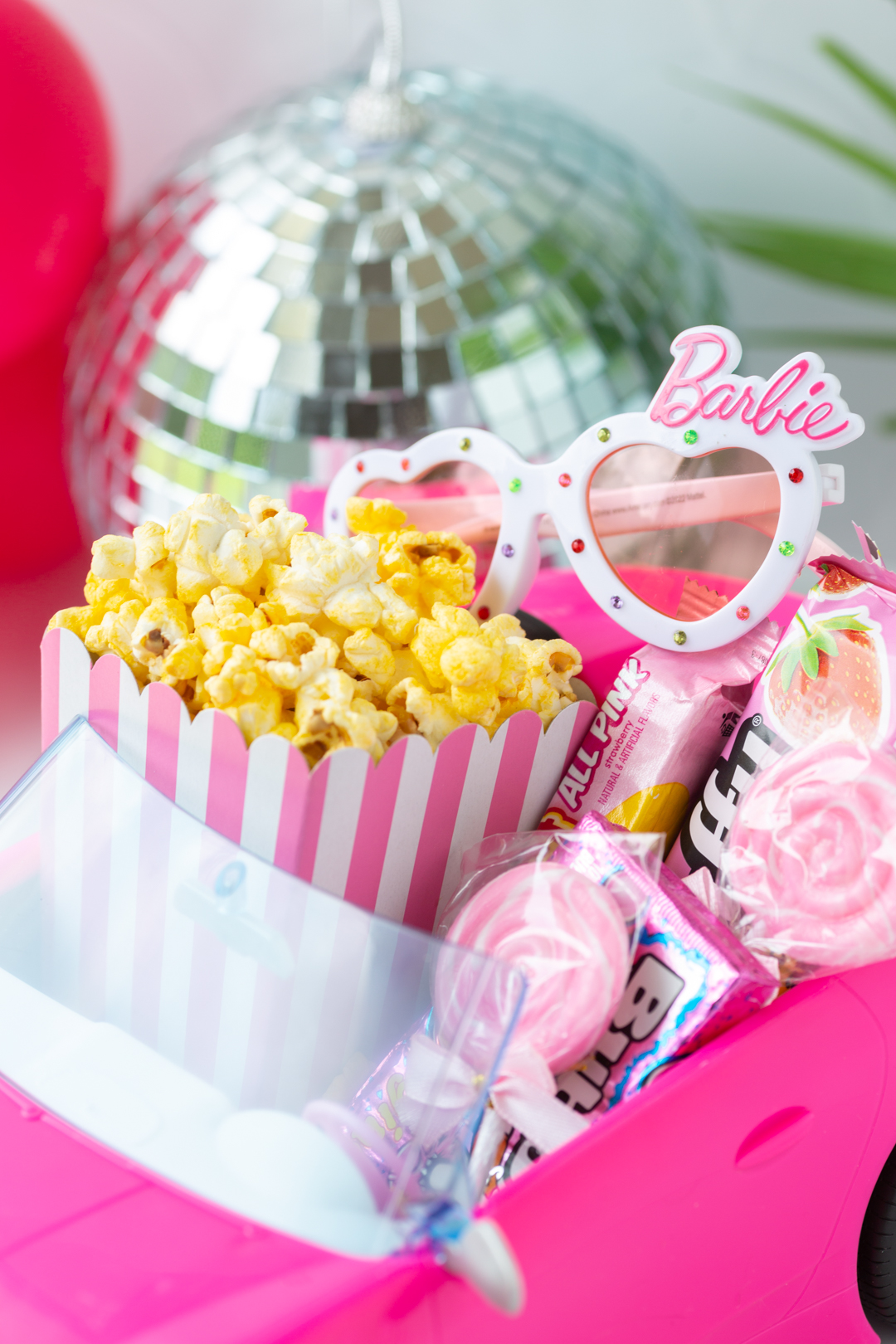 movie snacks set inside of a barbie car