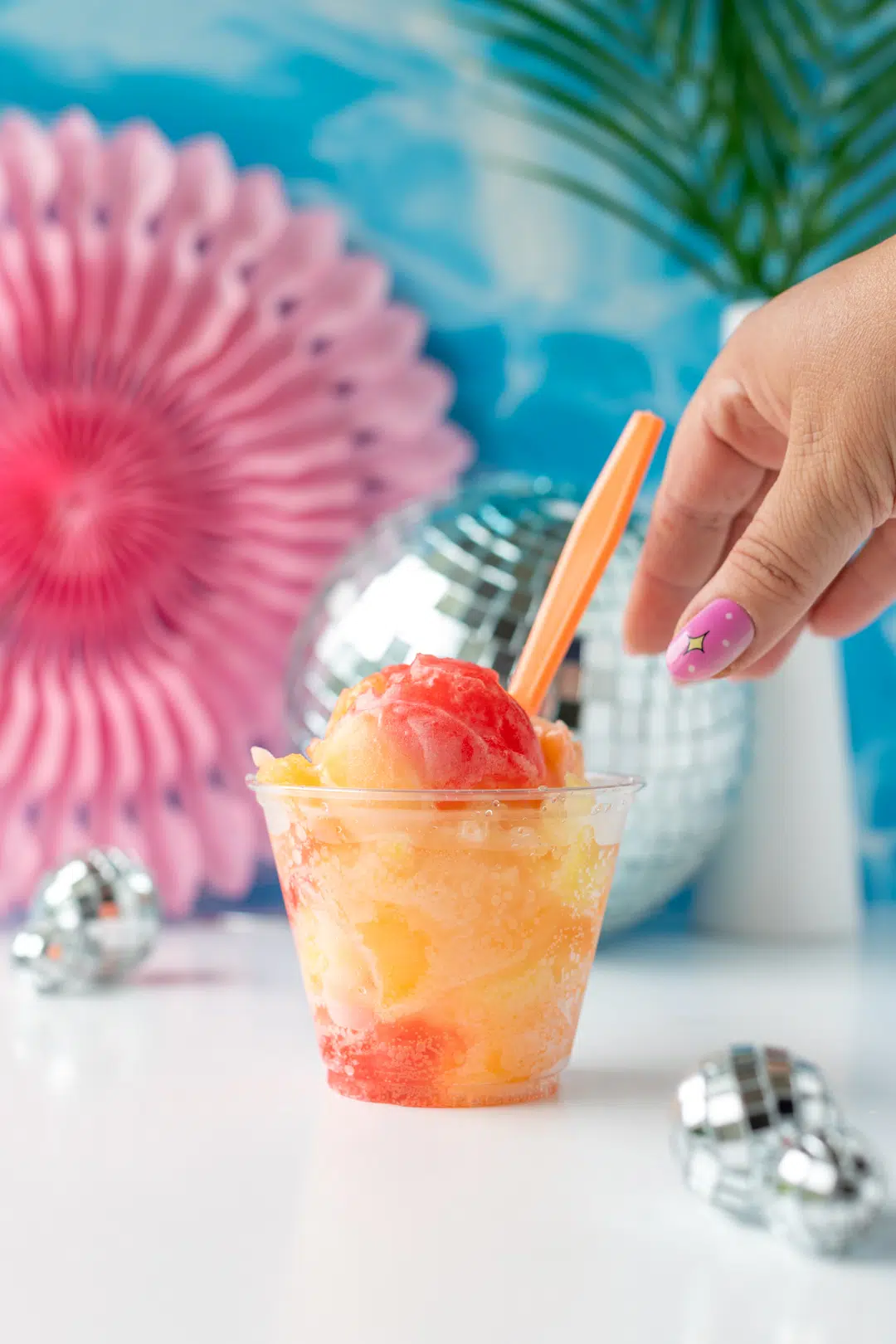 woman reaching for italian ice with soda, italian ice float for summer.