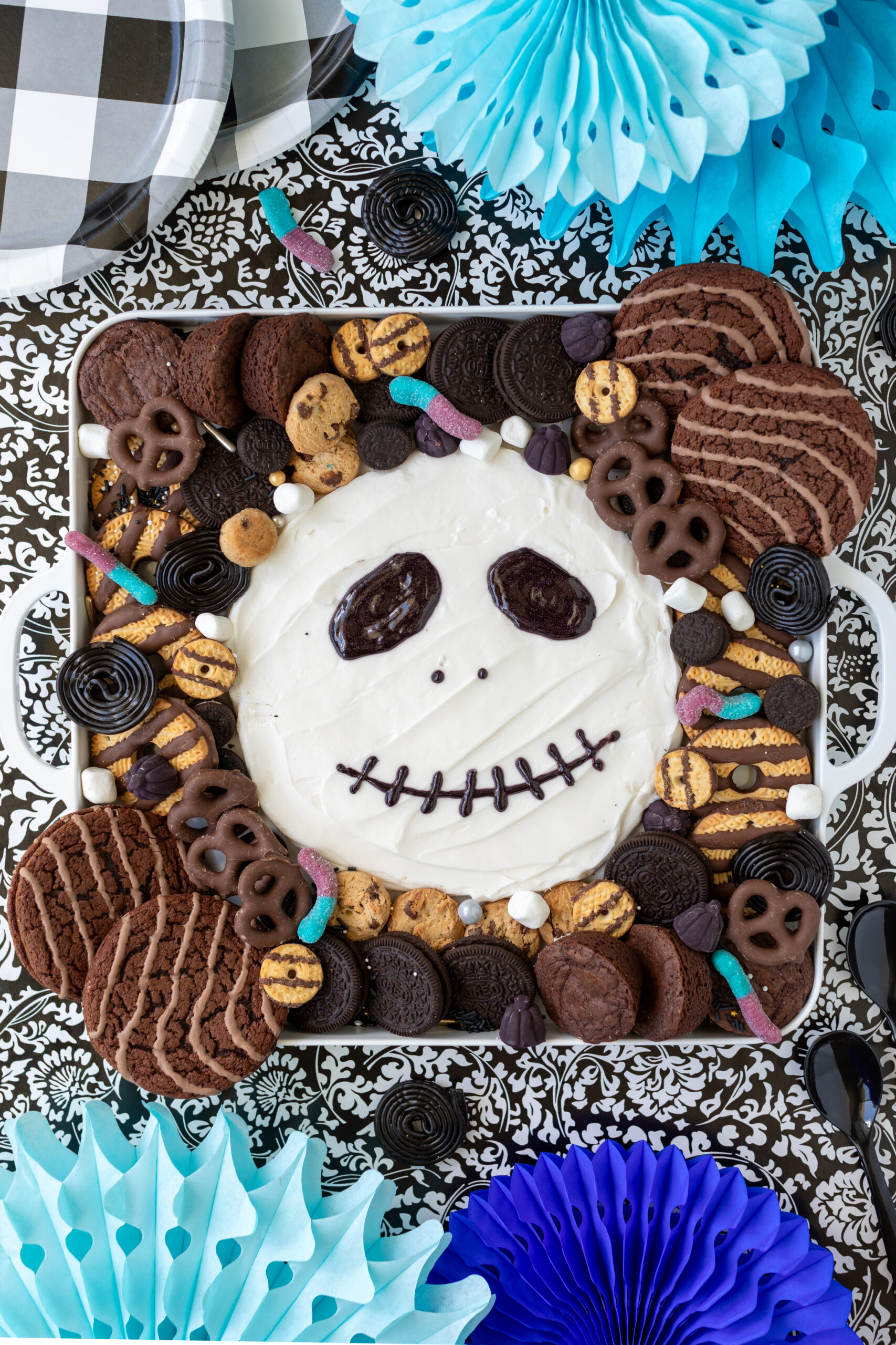 jack skellington frosting board served with cookies, brownies and dippable treats