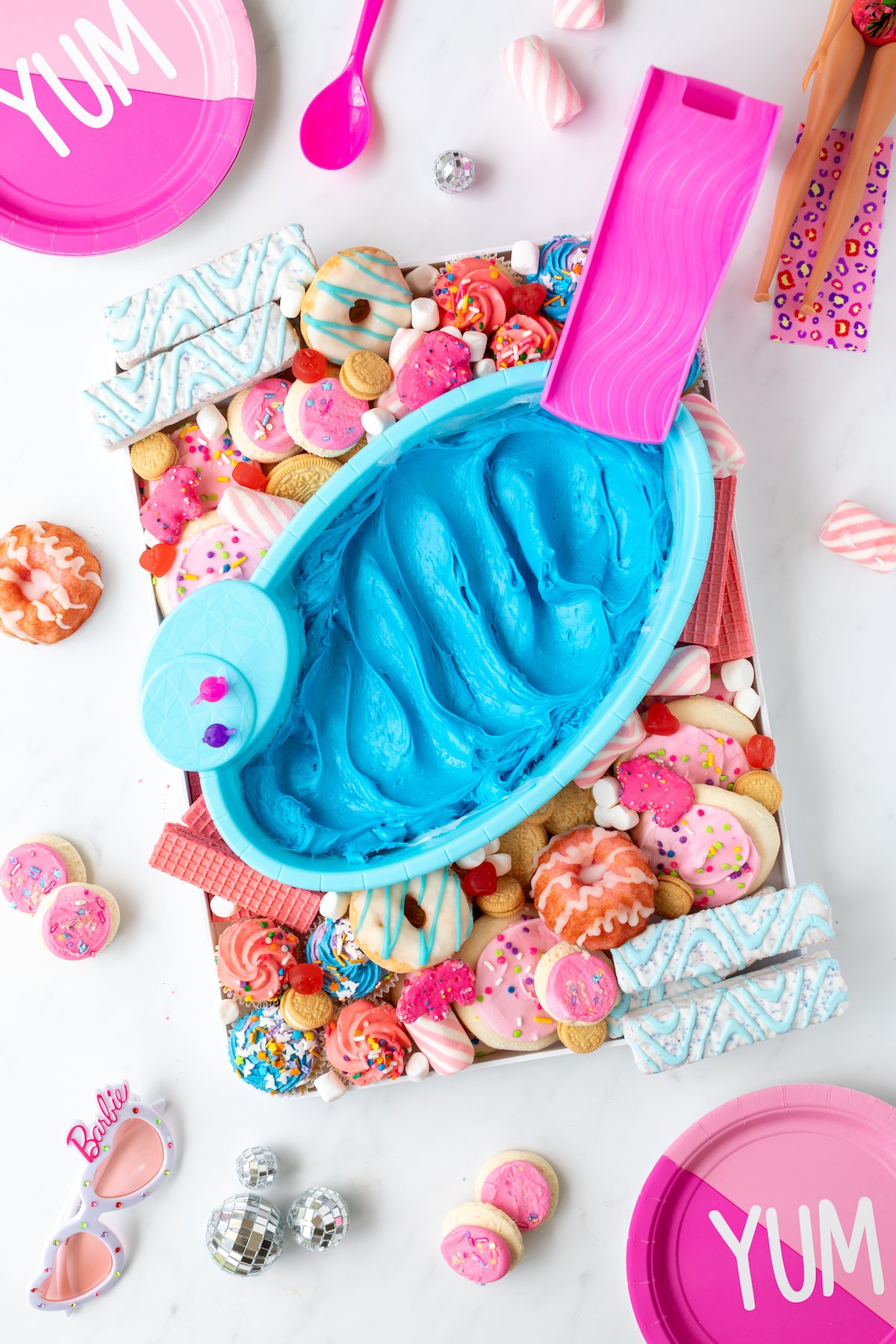 barbie dessert board with a frosting pool dip.