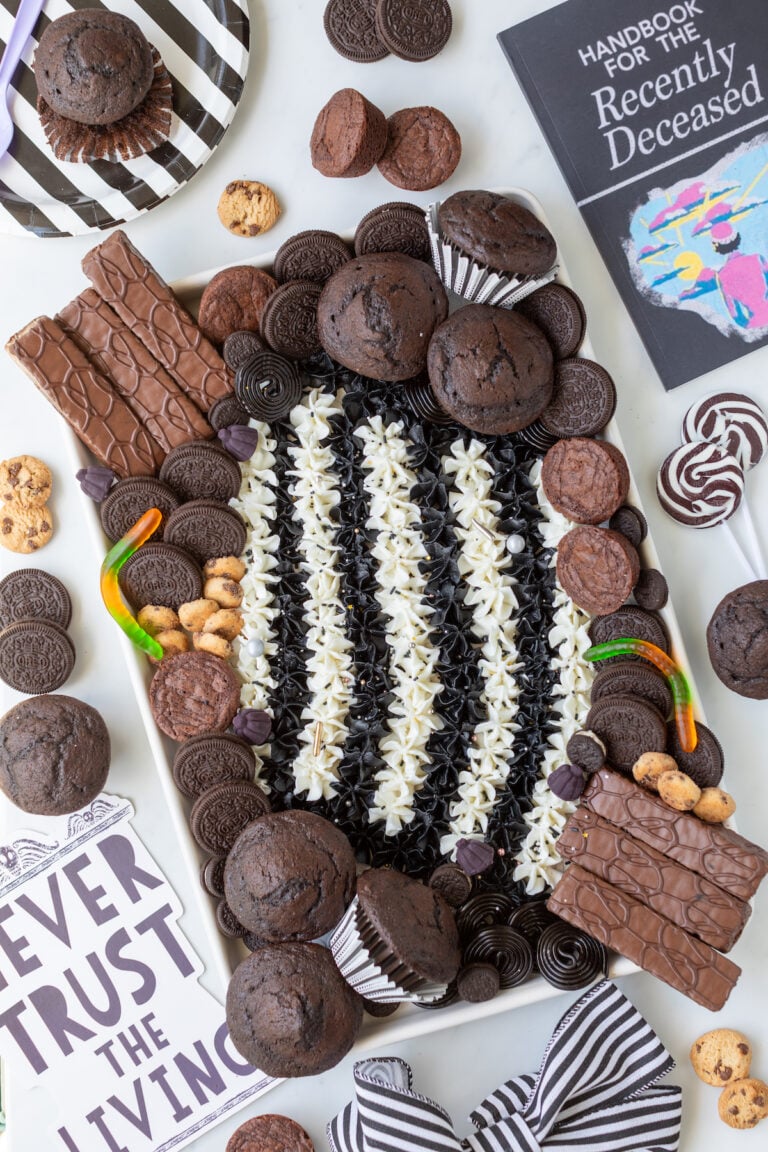 Fun buttercream board with a beetlejuice theme.