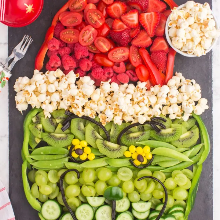 grinch made with fruit and vegetables, as a grinch fruit tray