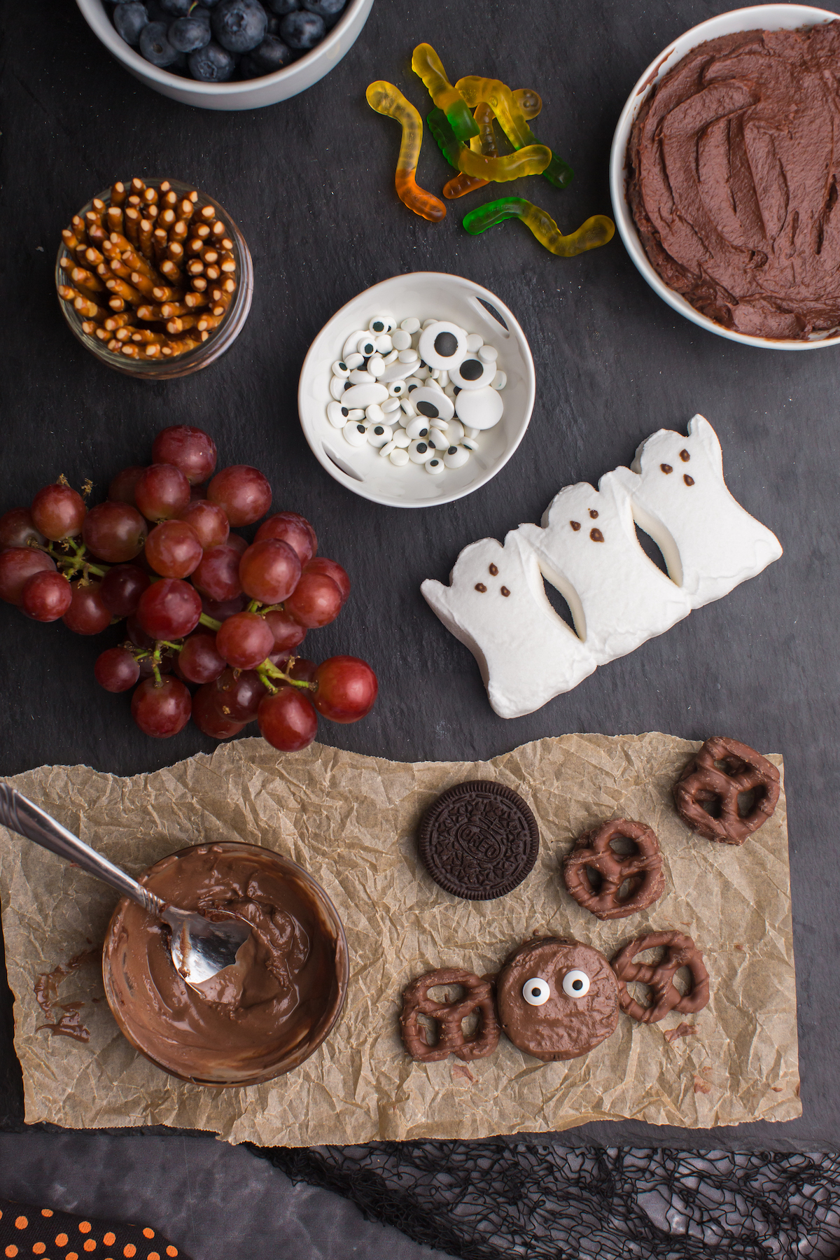 ingredients used to make a spooky charcuterie board that looks like a forest