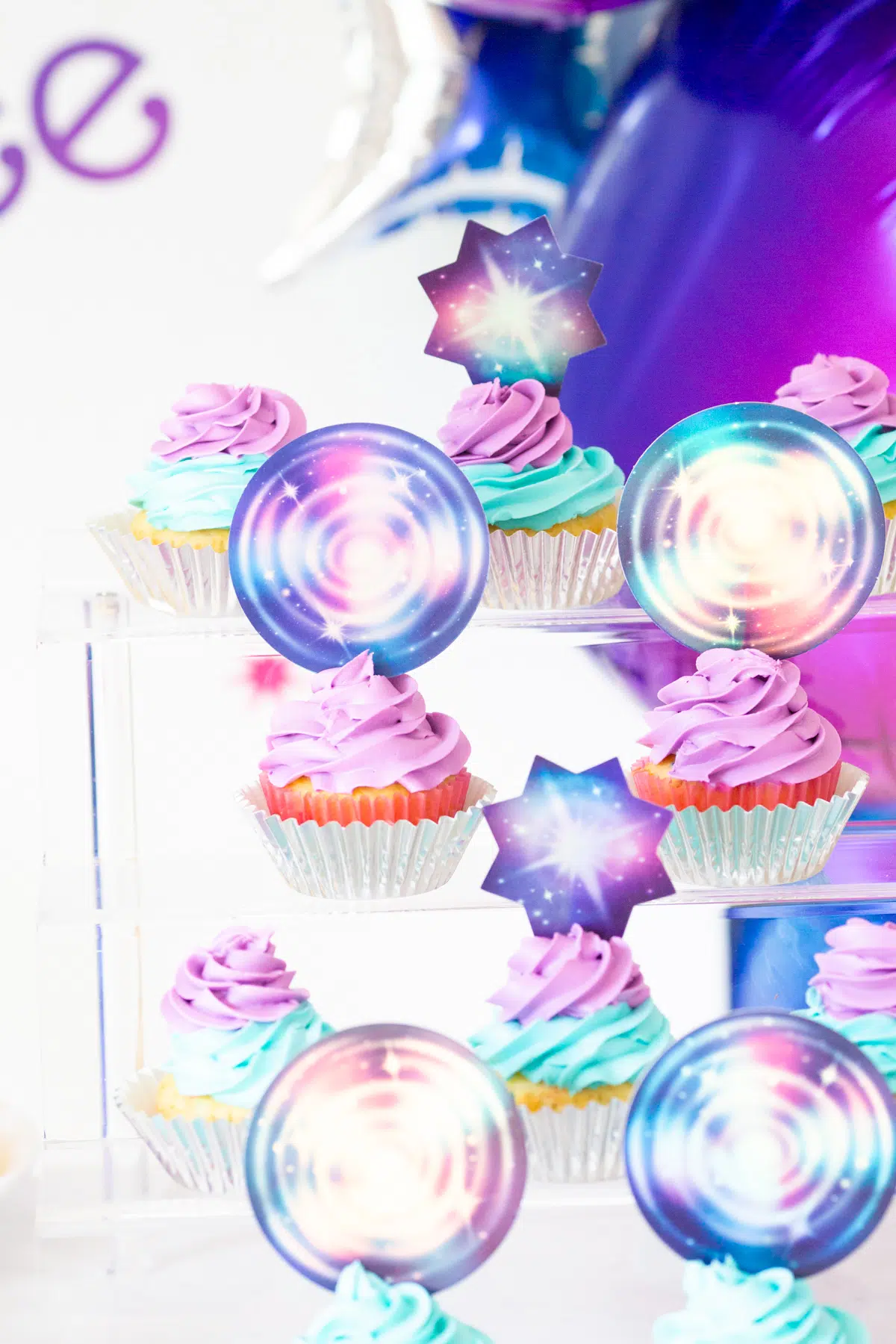 galaxy cupcakes with cute cupcake toppers