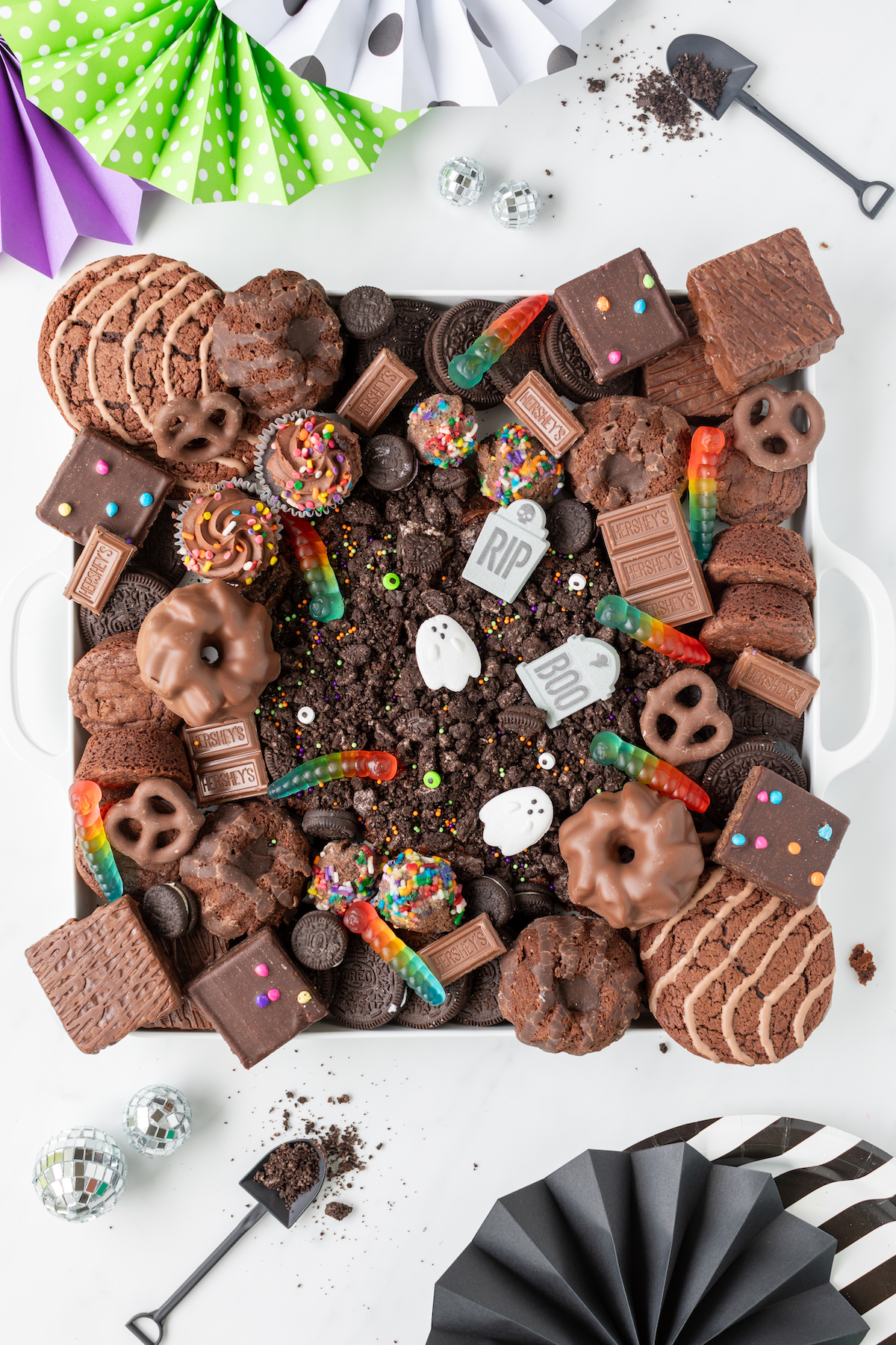 pretty chocolate treat tray for halloween with dirt and worms vibe