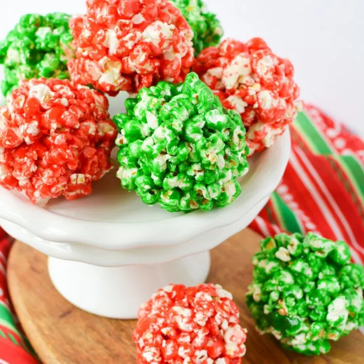 Christmas popcorn balls on a white stand