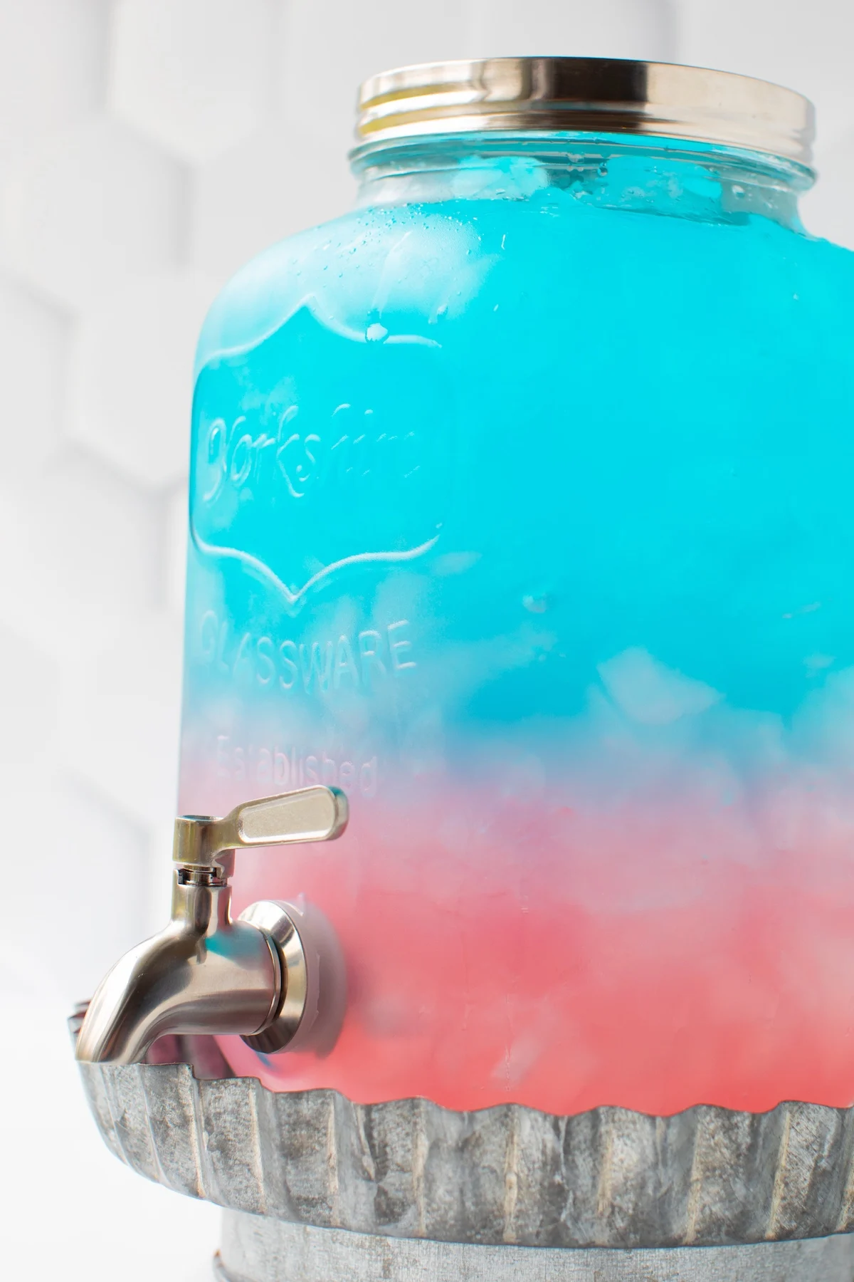 layered red and blue drink in dispenser