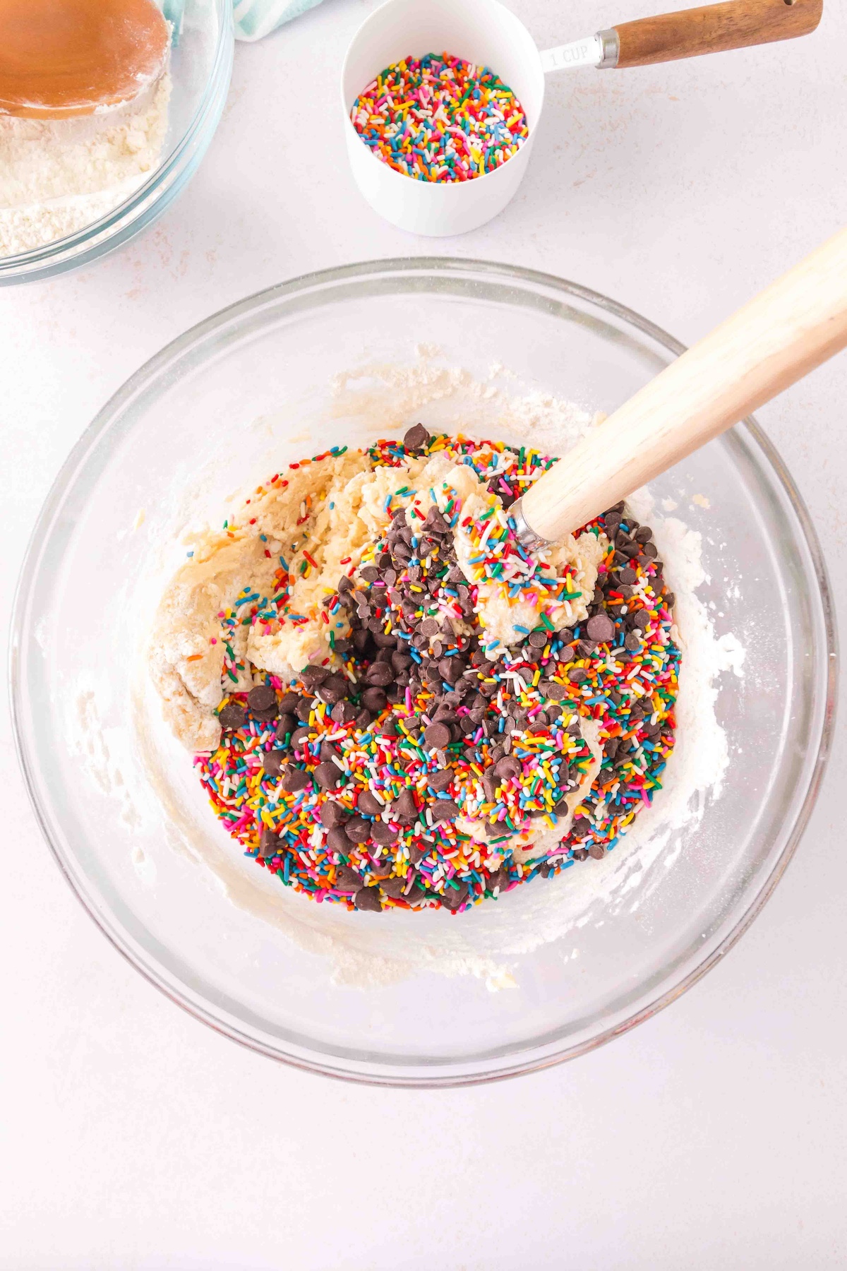 sprinkles in the bowl of cookie dough