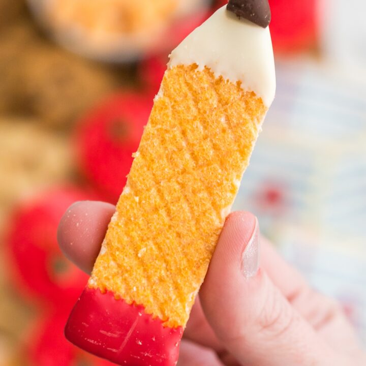 pencil cookie in a hand