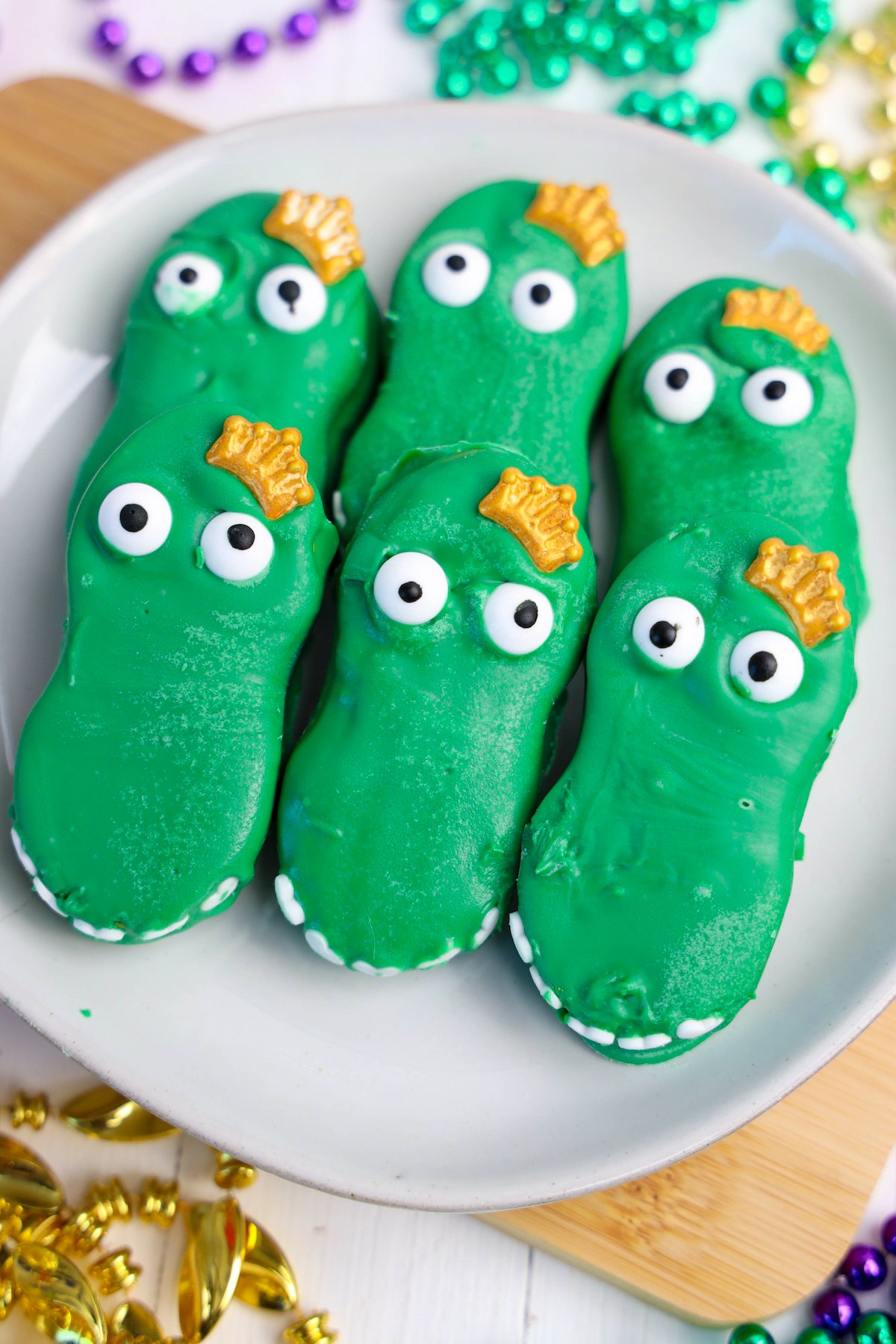 Alligator cookies on a white plate