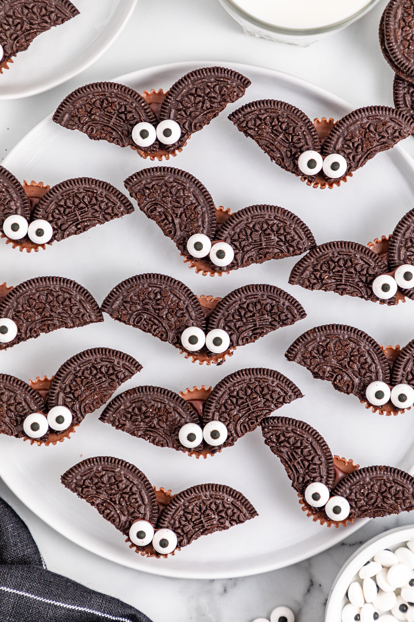 Oreo Bat Cookies on a white plate
