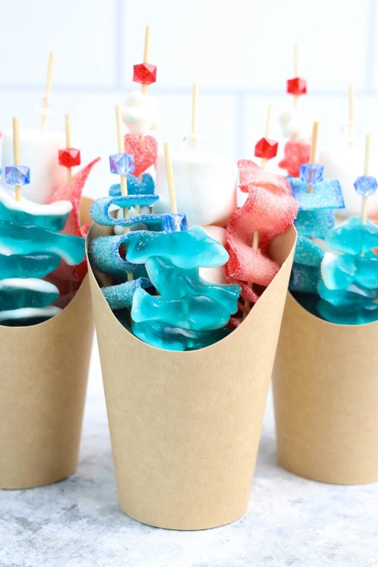 shark candy cups with gummy sharks in a brown cup