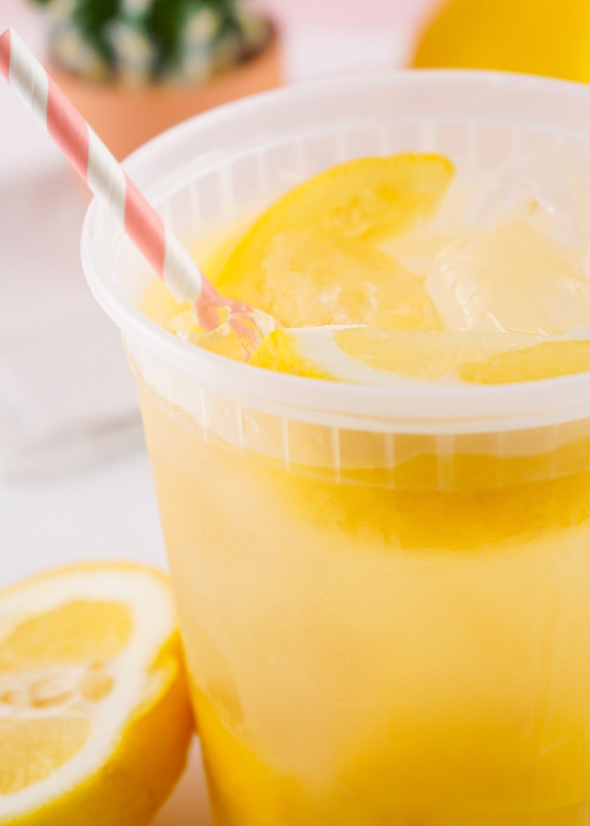 country fair lemonade TikTok inspired recipe with a pink and white straw