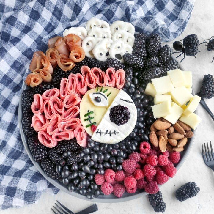 Jack Skellington Charcuterie Board with a blue checkered napkin