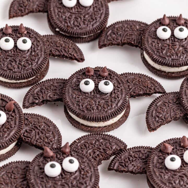 Oreo bat cookies on a white plate