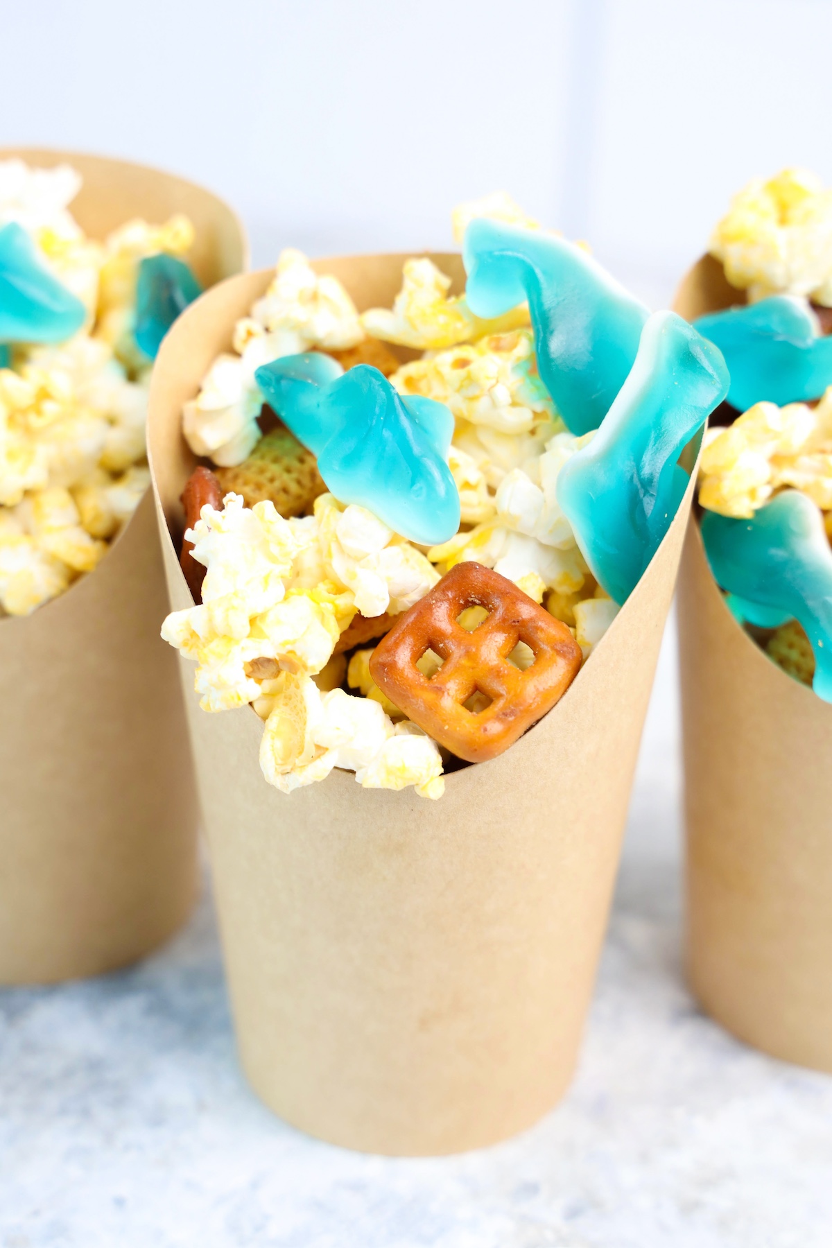 shark snack cup with popcorn, chex mix and shark gummines