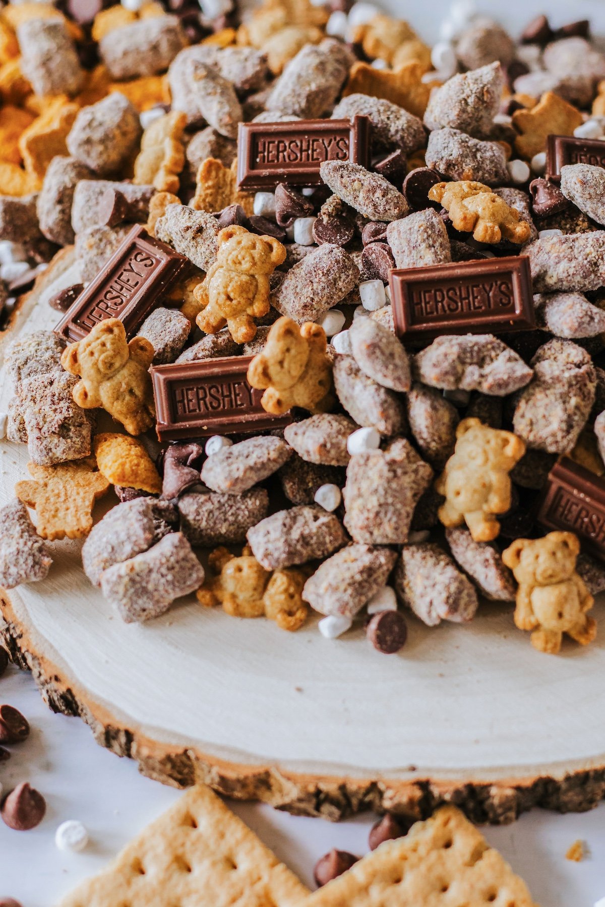 s'mores muddy buddies with chocolate and teddy grahams