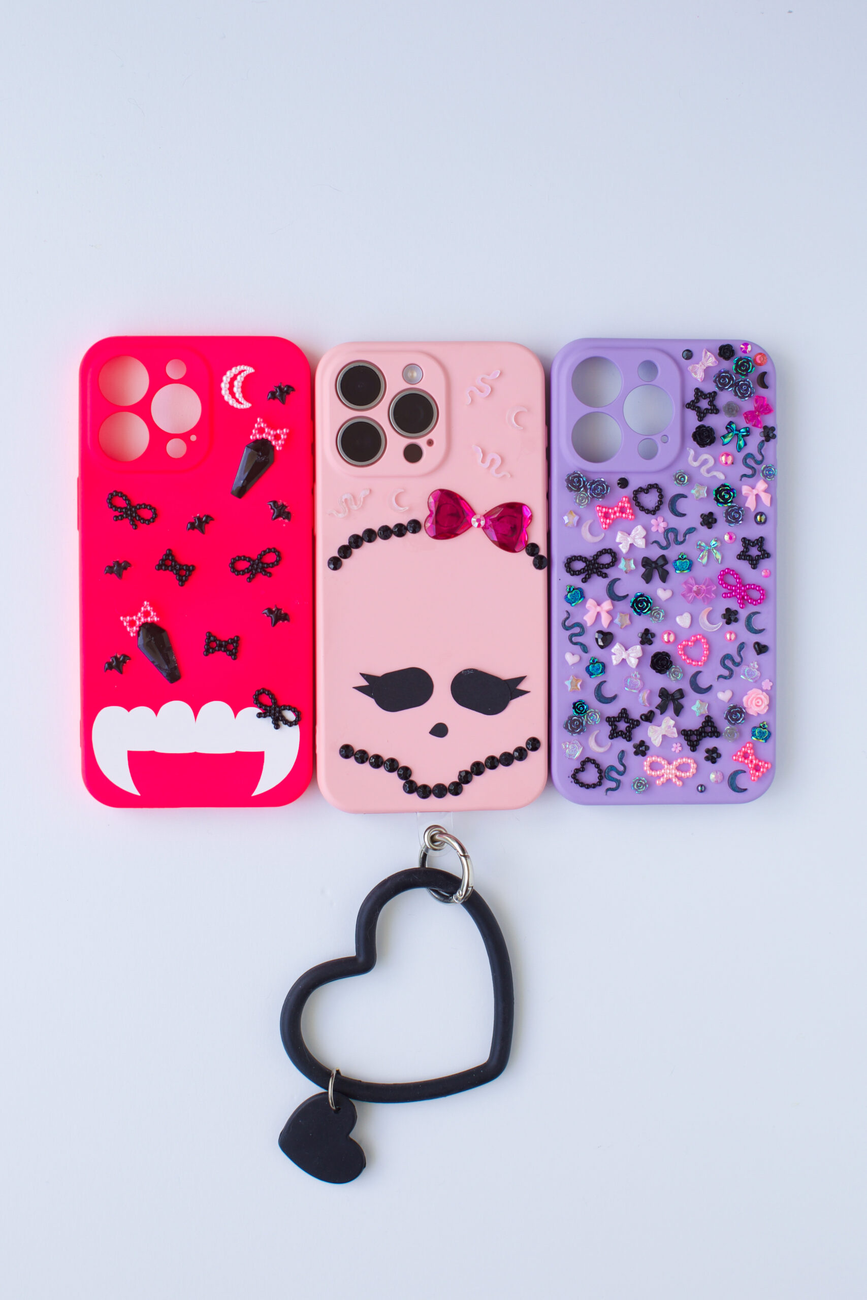 Monster High Phone Cases that you can make. Pink, Purple, coffin gems.