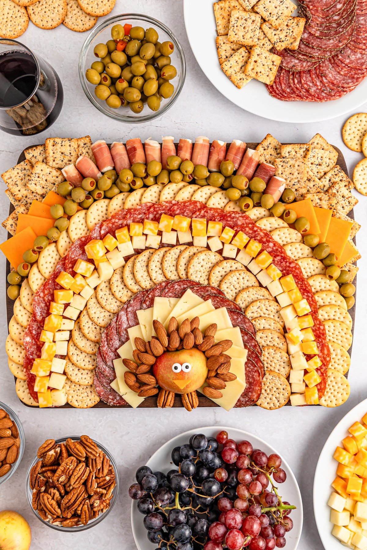 Turkey Charcuterie Board with food around it