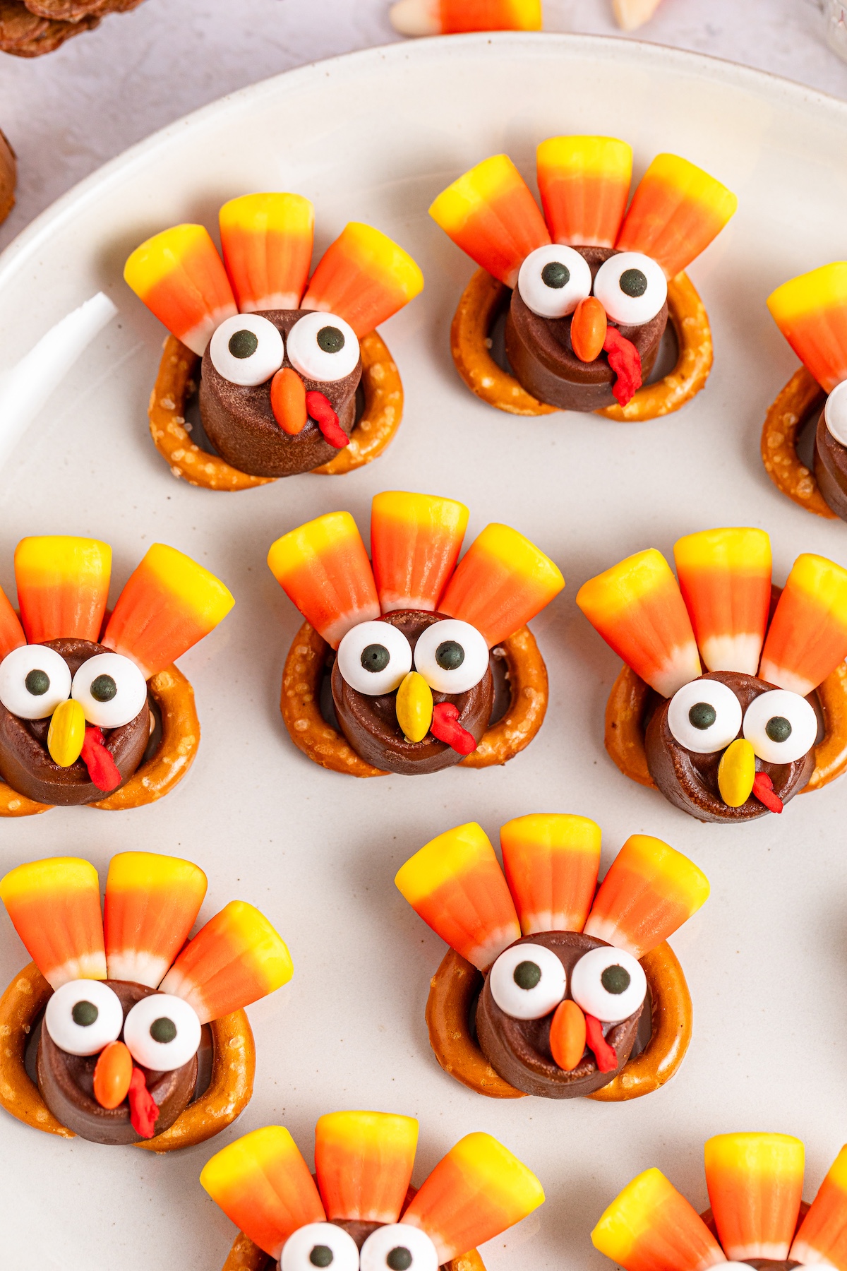 mini pretzel turkeys on a white plate