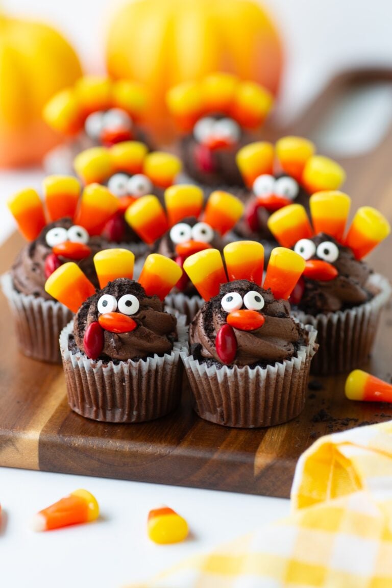 pretty little mini turkey cupcakes with candy decorations.