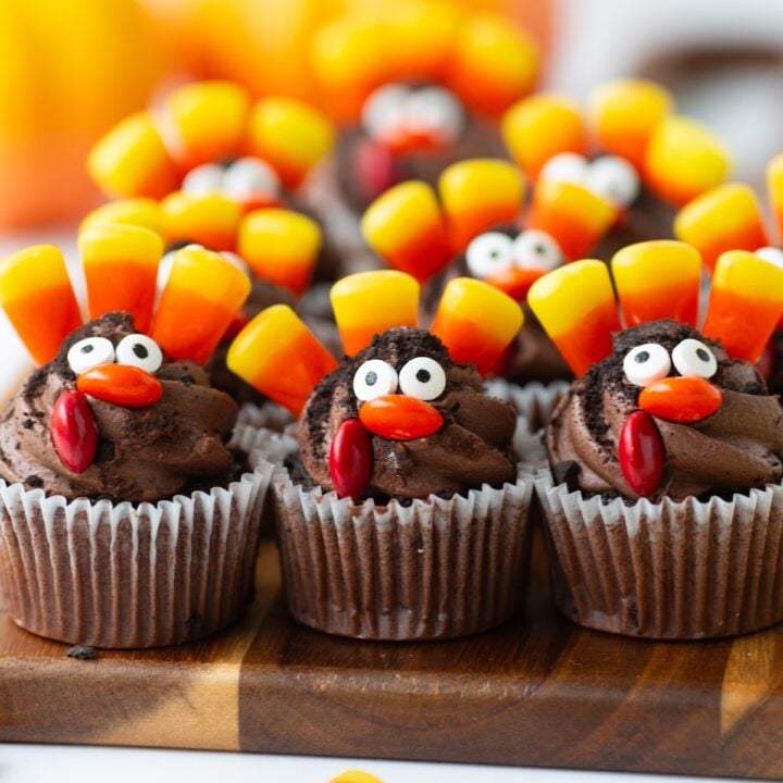 mini turkey cupcakes with candy corn on a serving tray