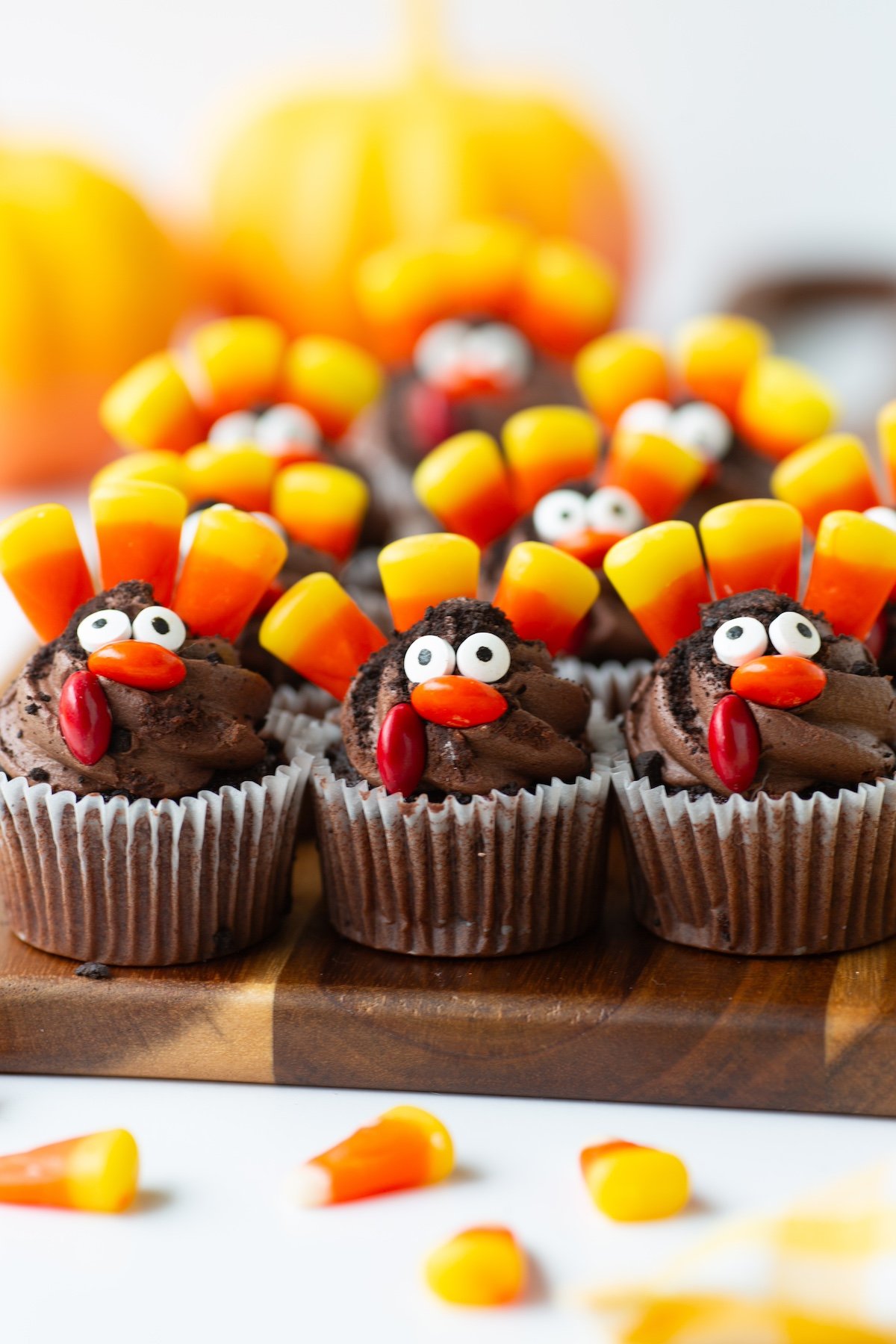 mini turkey cupcakes with candy corn on a serving tray