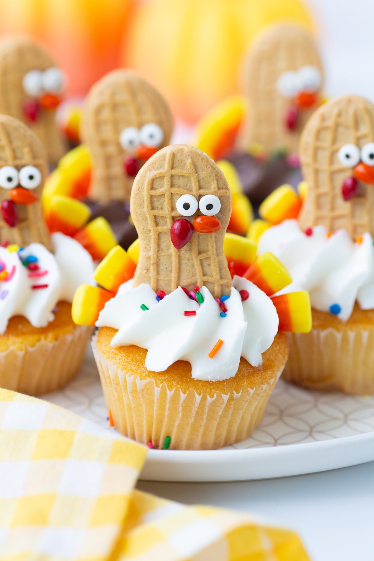 cute turkey cupcakes made with walmart cupcakes, nutter butter cookies and candy corn.