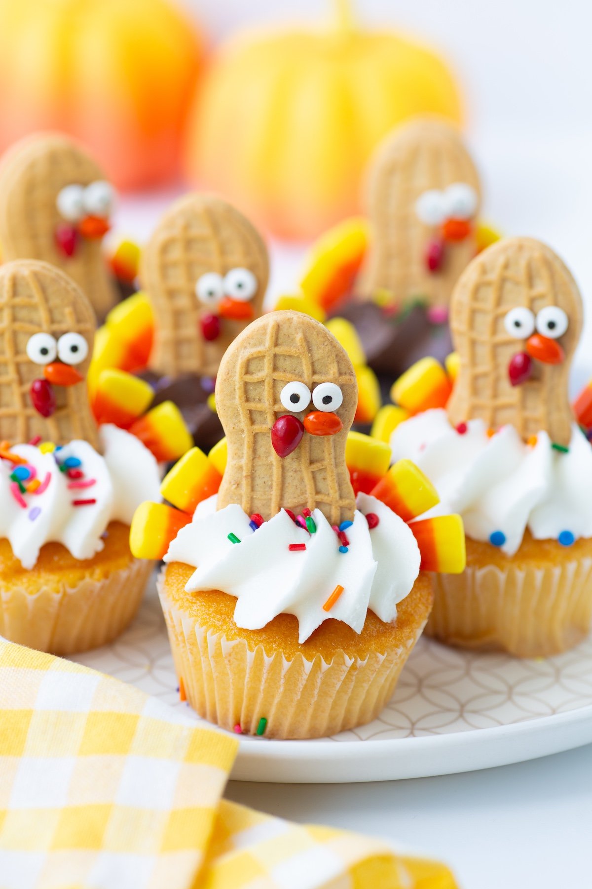 adorable thanksgiving cupcakes on a serving plate.