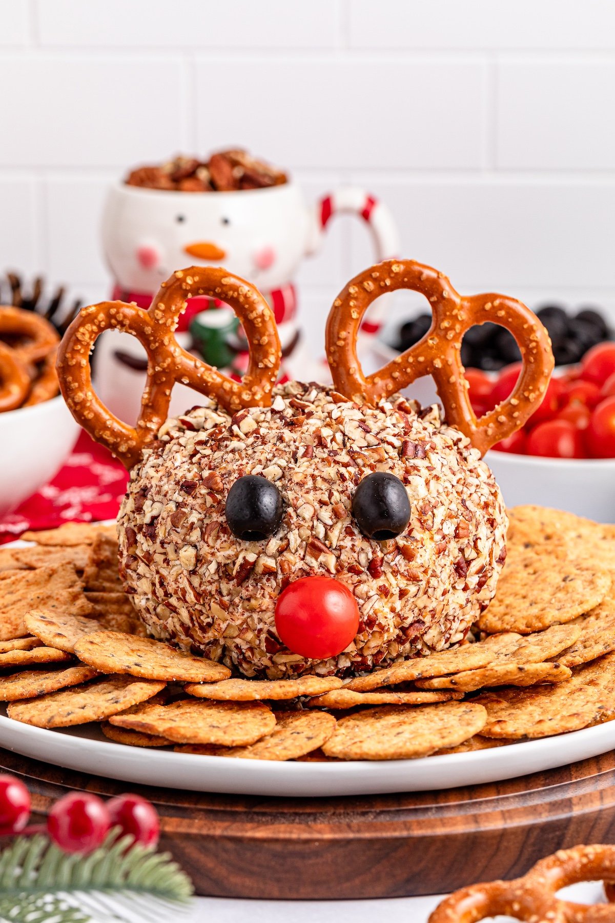 Reindeer Cheese Ball with crackers on the plate