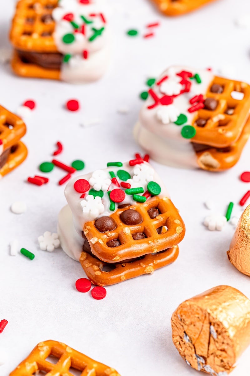 Christmas pretzel sandwiches on a white background