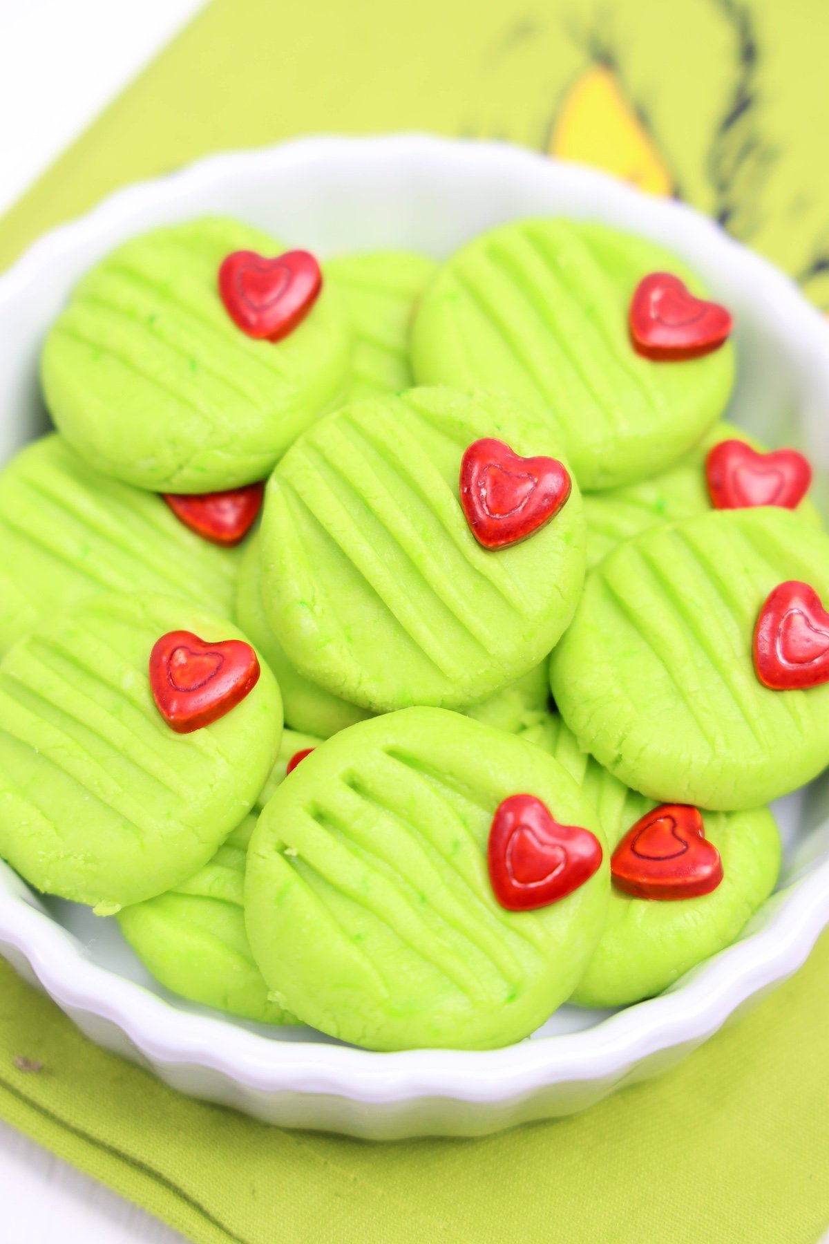 Grinch Cream Cheese Mints in a white bowl