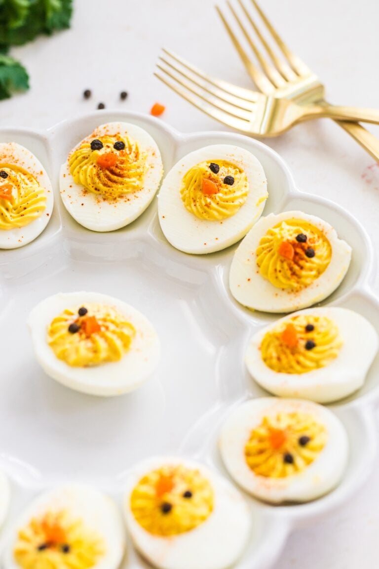 baby chick delived eggs on a white plate